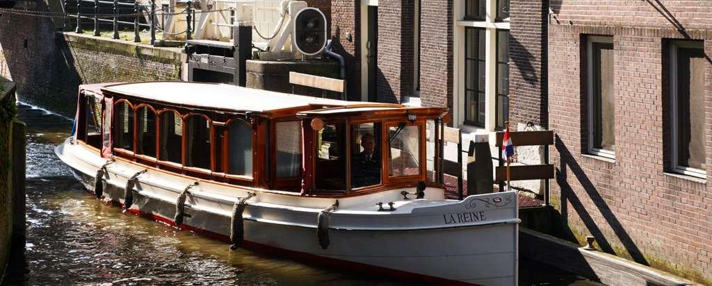 Nh Collection Amsterdam Barbizon Palace Hotel Exterior photo A motor launch